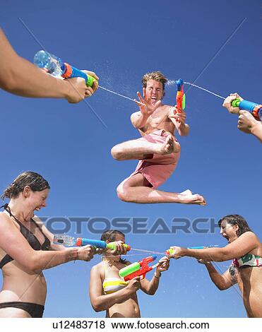 Stock Photo - water fight. Fotosearch