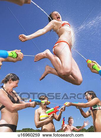 water fight View Large Photo Image Stock Photo - water fight. Fotosearch
