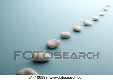 White stones all lined up in perspective View Large Photo Image Stock Photo - White stones all lined up in perspective. Fotosearch