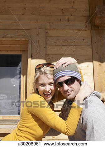 Stock Image - woman and man embrace. Fotosearch