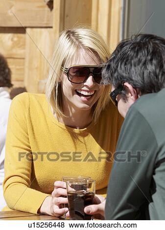 woman and man enjoying drink View Large Photo Image Stock Photo - woman and man enjoying drink. Fotosearch