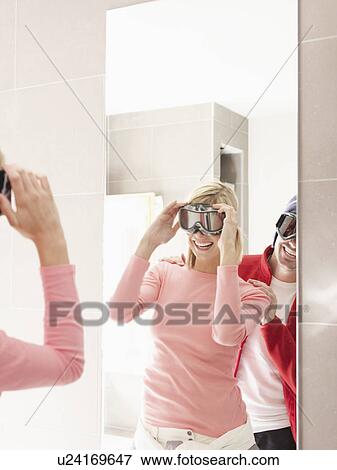woman and man reflection in mirror View Large Photo Image Stock Photo - woman and man reflection in mirror. Fotosearch