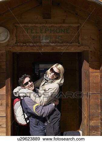 woman and man with ski gear at hut View Large Photo Image Stock Photo - woman and man with ski gear at hut. Fotosearch