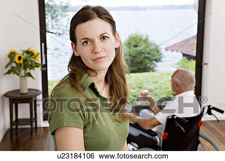 woman caring for man in wheelchair View Large Photo Image Stock Photograph - woman caring for man in wheelchair. Fotosearch