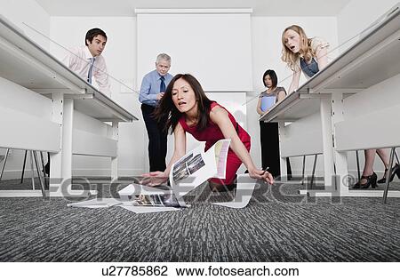 woman falling scattering documents View Large Photo Image Stock Image - woman falling scattering documents. Fotosearch