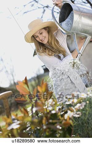 woman gardening View Large Photo Image Stock Image - woman gardening. Fotosearch