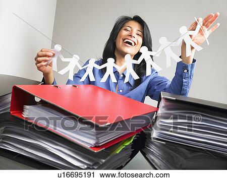 Woman having fun at work View Large Photo Image Stock Image - Woman having fun at work. Fotosearch