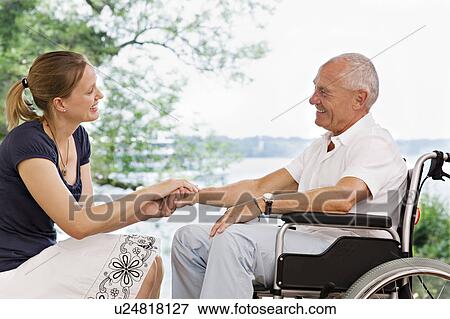 woman holding senior man's hand View Large Photo Image Stock Photo - woman holding senior man's hand. Fotosearch