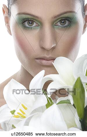 Woman holding white flowers View Large Photo Image Stock Photography - Woman holding white flowers. Fotosearch