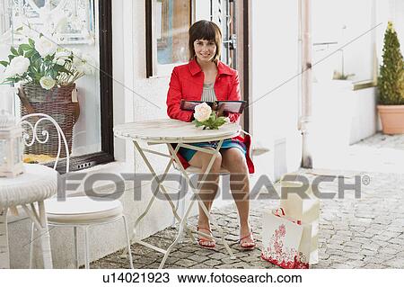 woman in a street cafe View Large Photo Image Stock Image - woman in a street cafe. Fotosearch