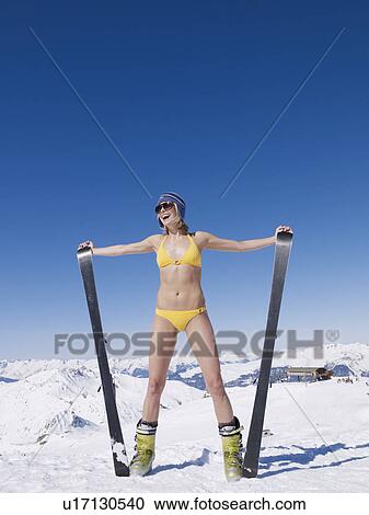 woman in bikini on mountain with skis View Large Photo Image Stock Image - woman in bikini on mountain with skis. Fotosearch