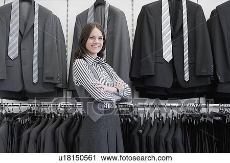woman in clothing store View Large Photo Image Stock Image - woman in clothing store. Fotosearch