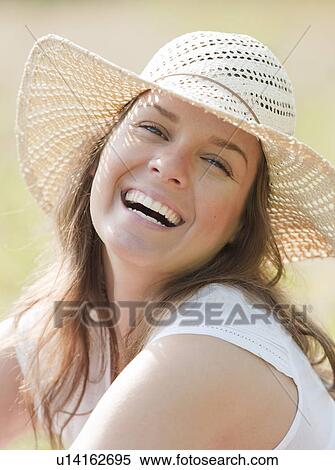 woman in hat smiling, eyes closed View Large Photo Image Stock Photography - woman in hat smiling, eyes closed. Fotosearch