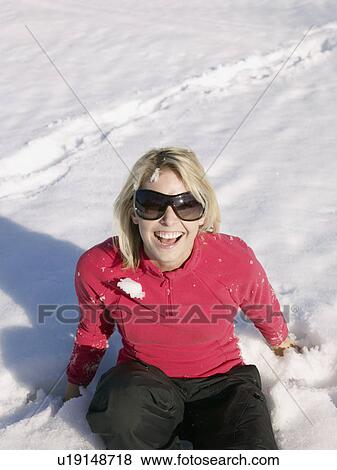 woman laughing in the snow View Large Photo Image Stock Photo - woman laughing in the snow. Fotosearch
