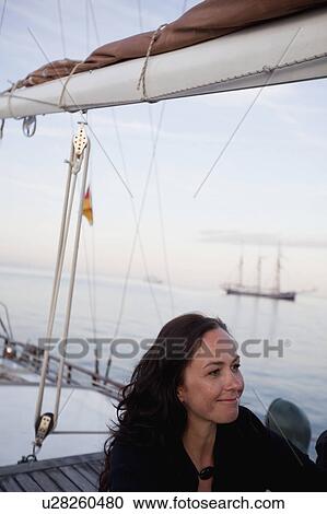 woman on a boat smiling View Large Photo Image Stock Image - woman on a boat smiling. Fotosearch