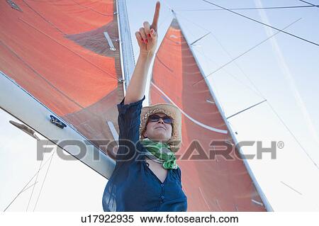 woman on a ship pointing with finger View Large Photo Image Stock Photography - woman on a ship pointing with finger. Fotosearch