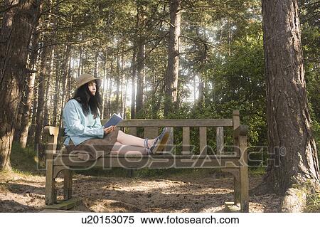 Stock Photography - Woman reading book. Fotosearch