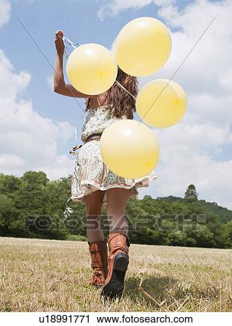 woman running with balloons View Large Photo Image Stock Image - woman running with balloons. Fotosearch