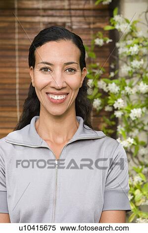 Stock Photography - woman ' s portrait smiling. Fotosearch