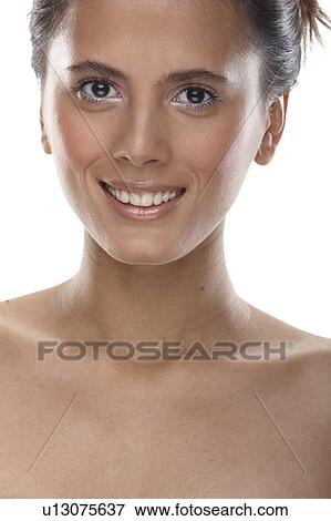 Woman smiling on white background View Large Photo Image Stock Photo - Woman smiling on white background. Fotosearch