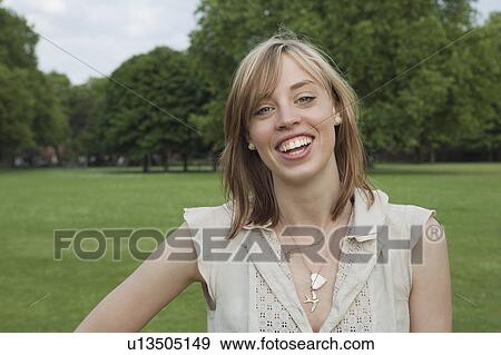 Woman smiling View Large Photo Image Stock Photo - Woman smiling. Fotosearch