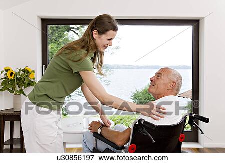 woman touching man in wheelchair View Large Photo Image Stock Photo - woman touching man in wheelchair. Fotosearch