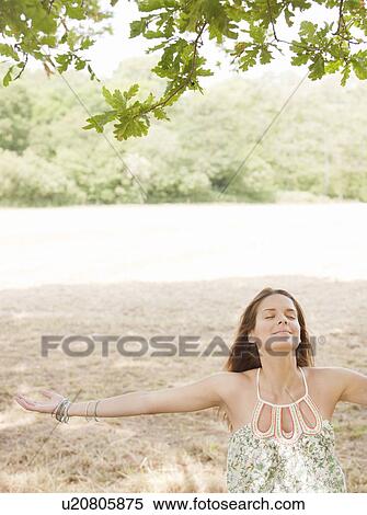 woman with arms outstretched View Large Photo Image Stock Photography - woman with arms outstretched. Fotosearch