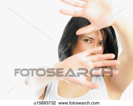 Woman with hands in the way of the shot View Large Photo Image Stock Image - Woman with hands in the way of the shot. Fotosearch