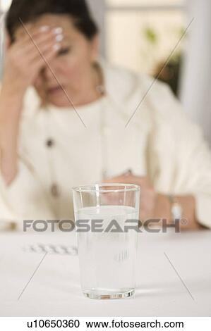Woman with headaches View Large Photo Image Stock Image - Woman with headaches. Fotosearch