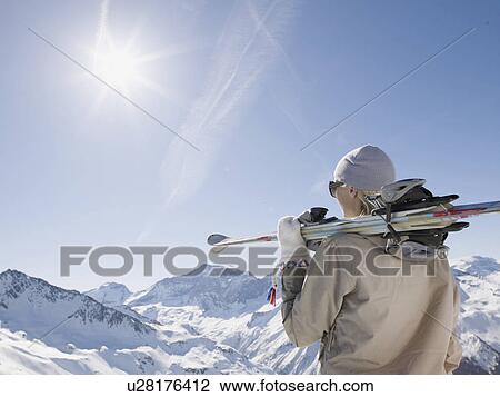 woman with skis on top of mountain View Large Photo Image Stock Image - woman with skis on top of mountain. Fotosearch