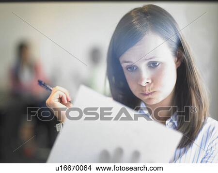 woman writing against window View Large Photo Image Picture - woman writing against window. Fotosearch
