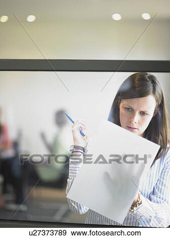 woman writing against window View Large Photo Image Stock Photo - woman writing against window. Fotosearch