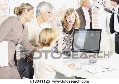 women are working in a office View Large Photo Image Stock Photography - women are working in a office. Fotosearch