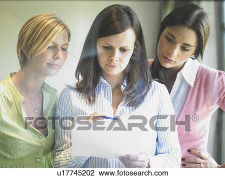 women at office window View Large Photo Image Stock Image - women at office window. Fotosearch