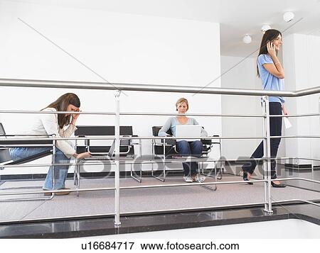 Stock Photo - women at the office. Fotosearch