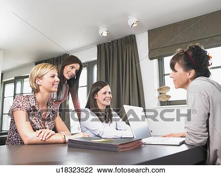 women in a reunion at the office View Large Photo Image Stock Image - women in a reunion at the office. Fotosearch