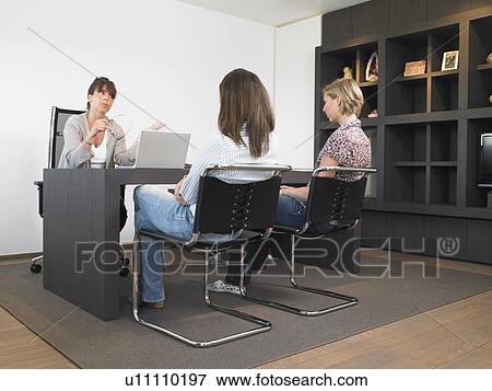 women in a reunion at the office View Large Photo Image Stock Photo - women in a reunion at the office. Fotosearch