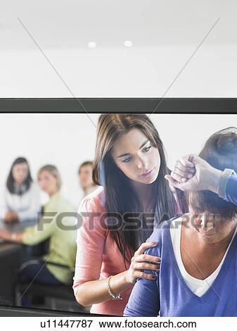 Stock Photo - women in a reunion at the office. Fotosearch