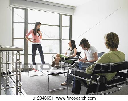 Stock Image - women in reunion. Fotosearch