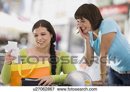women with shoppingbag and receipt View Large Photo Image Stock Photo - women with shoppingbag and receipt. Fotosearch