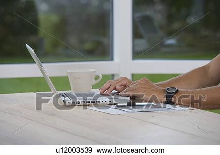 Working from home View Large Photo Image Stock Photo - Working from home. Fotosearch