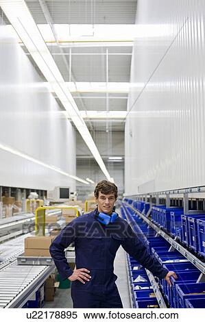 Stock Photography - workman at workplace. Fotosearch