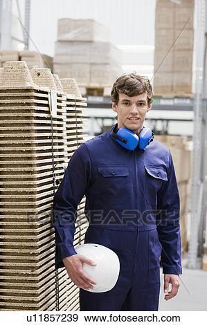 Stock Photo - workman in storage. Fotosearch