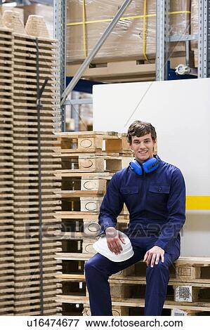 workman in storage View Large Photo Image Stock Photo - workman in storage. Fotosearch