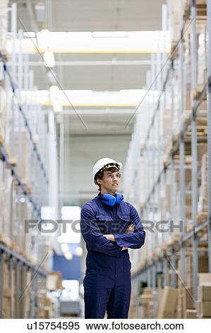 Stock Photography - workman in storage. Fotosearch