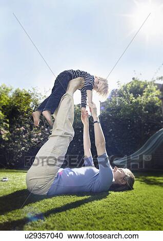Young boy with mother View Large Photo Image Stock Image - Young boy with mother. Fotosearch