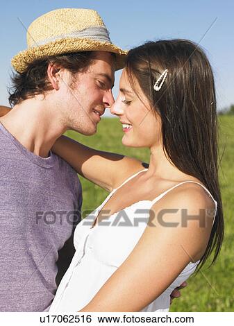 young couple in field View Large Photo Image Stock Photograph - young couple in field. Fotosearch
