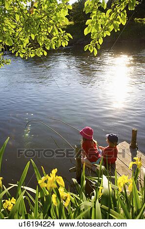 Young girl and boy fishing. View Large Photo Image Picture - Young girl and boy fishing.. Fotosearch