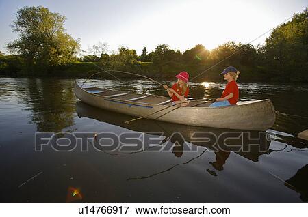 Stock Photo - Young girl and boy fishing.. Fotosearch