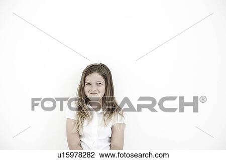 Young girl smiling to camera View Large Photo Image Stock Image - Young girl smiling to camera. Fotosearch